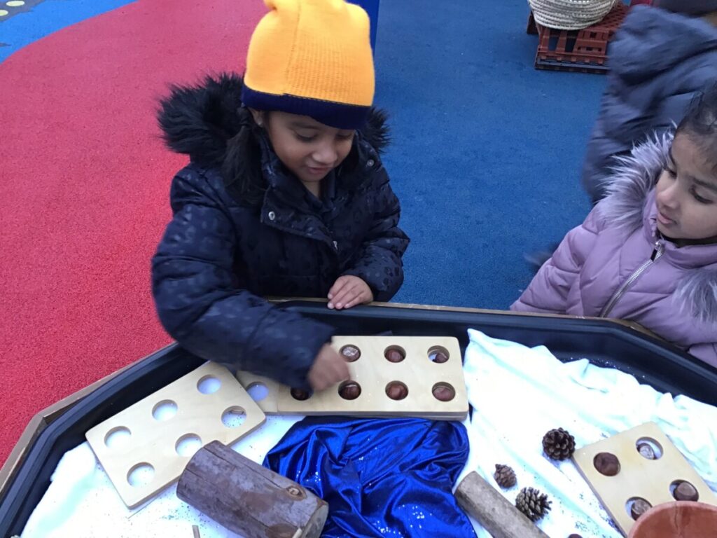 Using Numicon Outside Today we have been counting natural resources using the numicon pieces ...