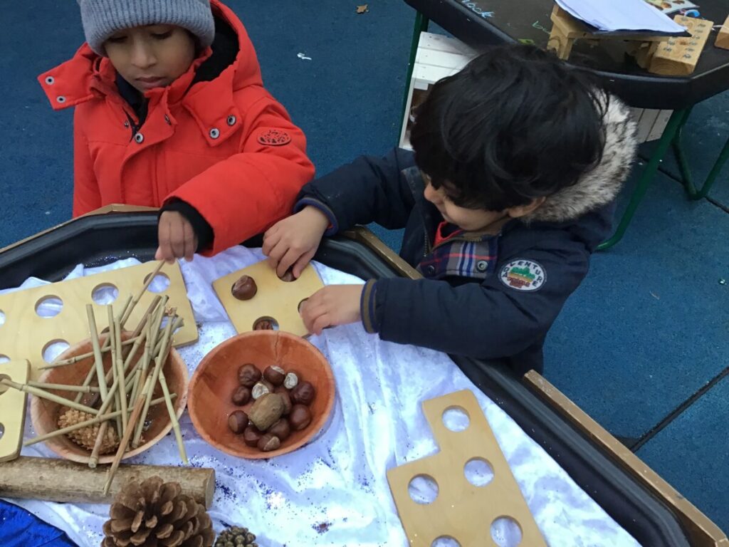 Using Numicon Outside Today we have been counting natural resources using the numicon pieces ...