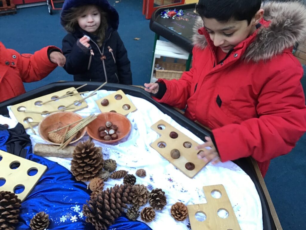 Using Numicon Outside Today we have been counting natural resources using the numicon pieces ...